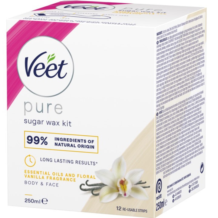 Veet Pure Sugar Wax Kit 250ml hårfjerningssett gir glatt hud i hvit eske med rosa detaljer og vaniljeblomst.