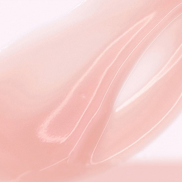 MÁDARA SOS Eye Revive Hydra Cream & Mask 20 ml fuktighetsgivende øyekrem med en glansfull lys rosa tekstur