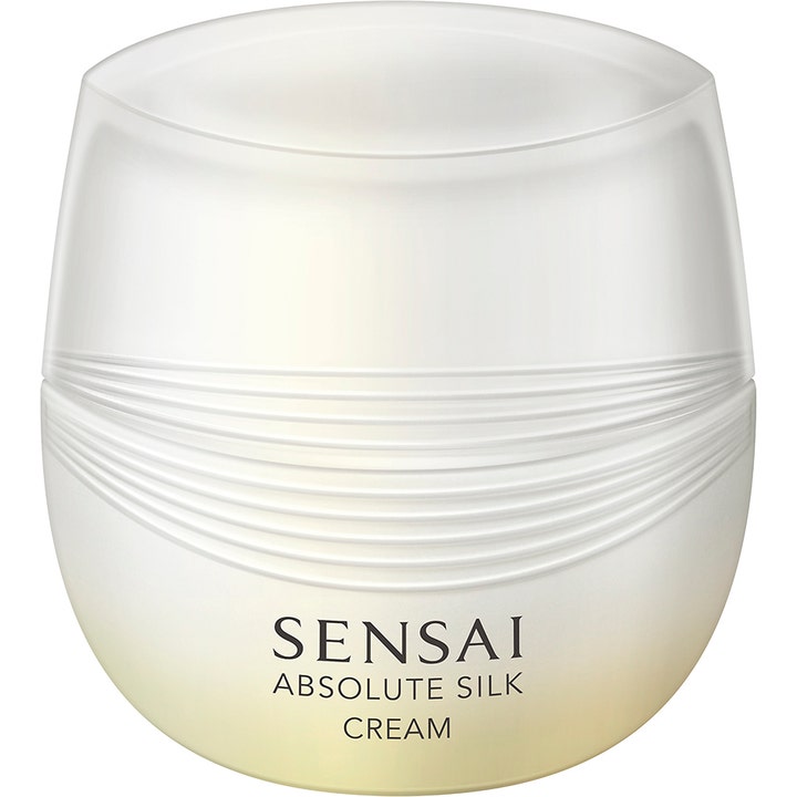 Sensai Absolute Silk Cream 40 ml ansiktskrem som gir silkemyk hud i en hvit perlemorskrukke med rillede detaljer.