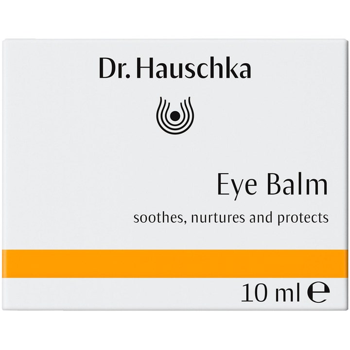 Dr. Hauschka Eye Balm 10 ml pleiende øyebalm som beroliger og beskytter i en hvit pakning med oransje stripe