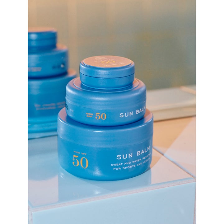 Rudolph Care Sun Balm SPF50 145 ml vannresistent solkrem i blå krukker som gir høy beskyttelse for sport og fritid.