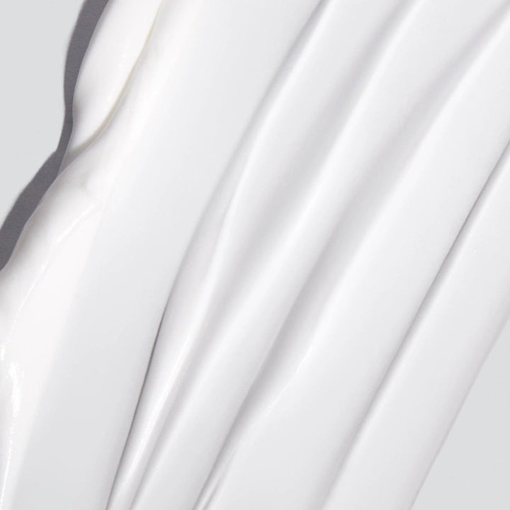 Dermalogica Skin Smoothing Cream 350 ml fuktighetsgivende hudpleie med en silkemyk og hvit kremtekstur