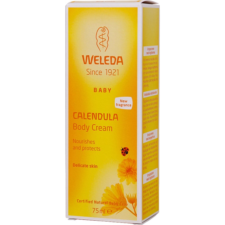 Weleda Baby Calendula Body Cream 75 ml pleiende barnekrem i gul eske med ringblomster og en liten marihøne.