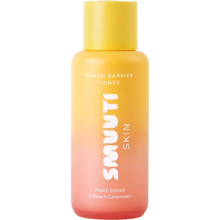 Smuuti Skin Peach Barrier Toner 150 ml styrkende ansiktsvann i en gul og ferskenfarget gradientflaske.