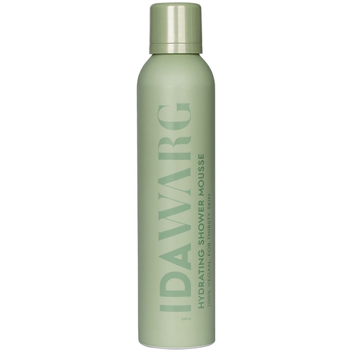 Ida Warg Hydrating Shower Mousse 200 ml fuktighetsgivende dusjskum som gir pleie i en lysegrønn matt sprayflaske.