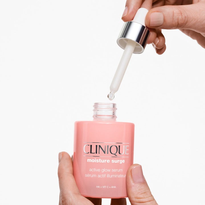 Clinique Moisture Marathon 80 ml fuktighetsgivende ansiktsserum i rosa glassflaske med pipette og HA.