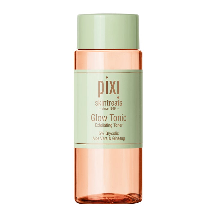 Pixi Glow Tonic eksfolierende ansiktsvann som gir glød i en klar oransje plastflaske med lysegrønn kork