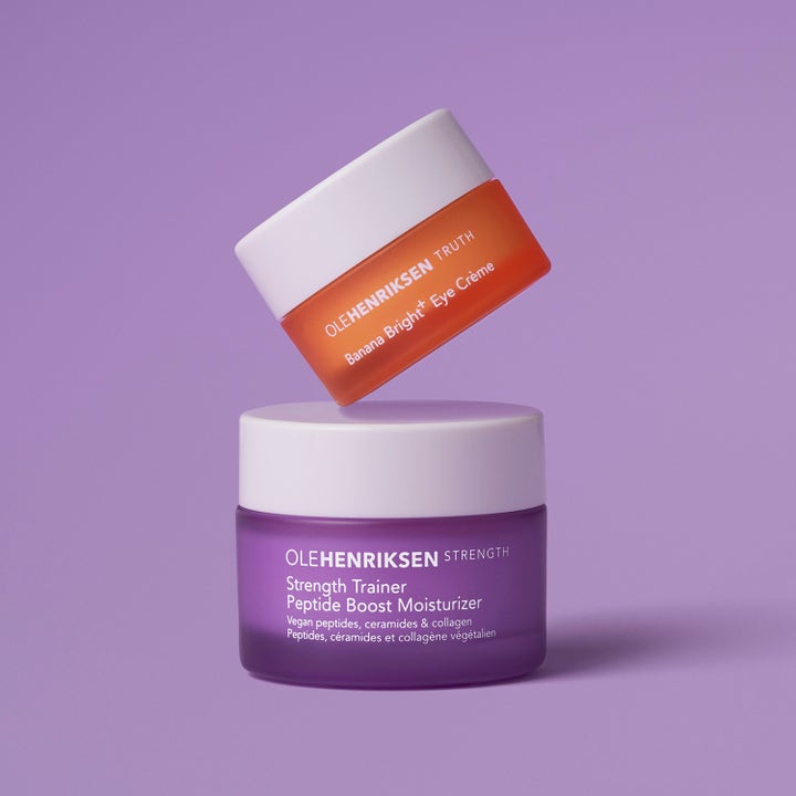 Ole Henriksen sett 22 ml med lilla fuktighetskrem og oransje øyekrem som gir fukt og glød i krukker med hvite lokk.