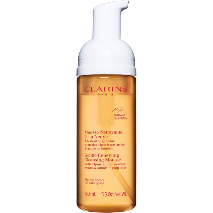 Clarins Gentle Renewing Cleansing Mousse 150 ml fornyende ansiktsrens i gjennomsiktig oransje flaske med hvit pumpe