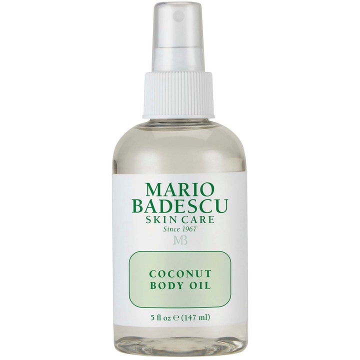 Mario Badescu Coconut Body Oil 147 ml fuktighetsgivende kroppsolje i klar sprayflaske med hvit pumpe og grønn etikett