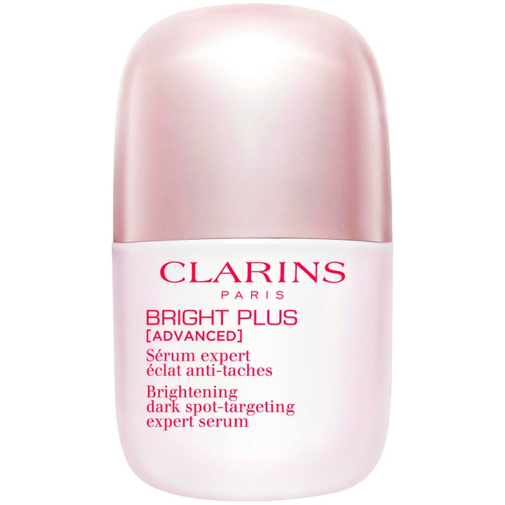 Clarins Bright Plus 50 ml glødgivende ansiktsserum mot mørke flekker i lyserosa avrundet flaske
