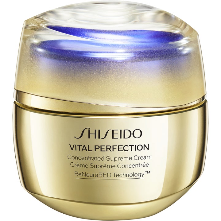 Shiseido Vital Perfection Concentrated Supreme Cream oppstrammende ansiktskrem i gullkrukke med lilla bølge i lokket