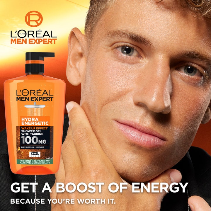 L'Oréal Paris Men Expert Hydra Energetic Shower Gel 1000 ml oppfriskende dusjsåpe i oransje pumpeflaske med en mann.