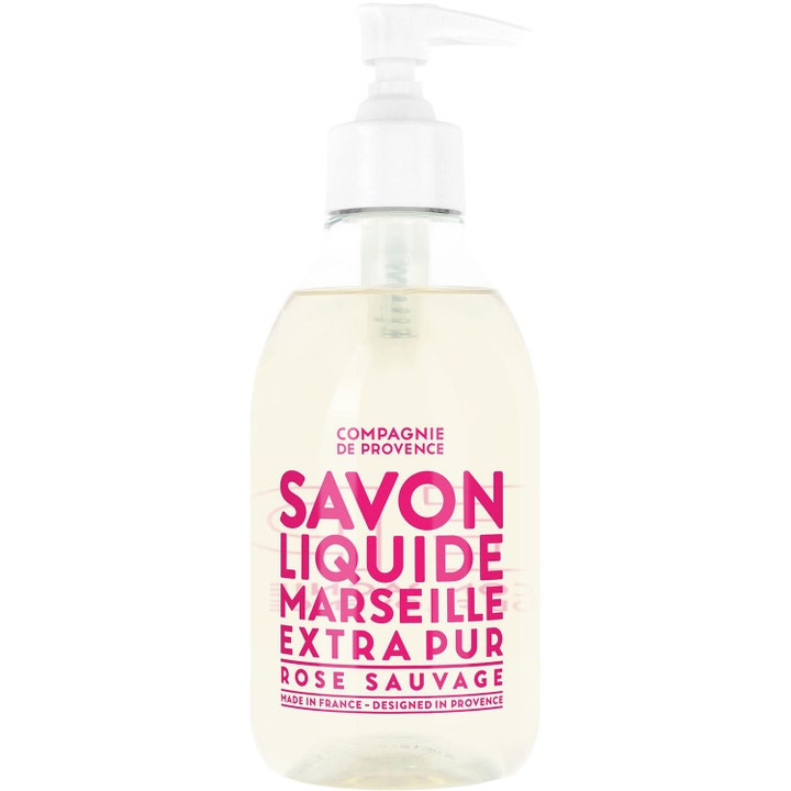 Compagnie de Provence Savon Liquide de Marseille Rose Sauvage flytende såpe i klar flaske med hvit pumpe og rosa tekst