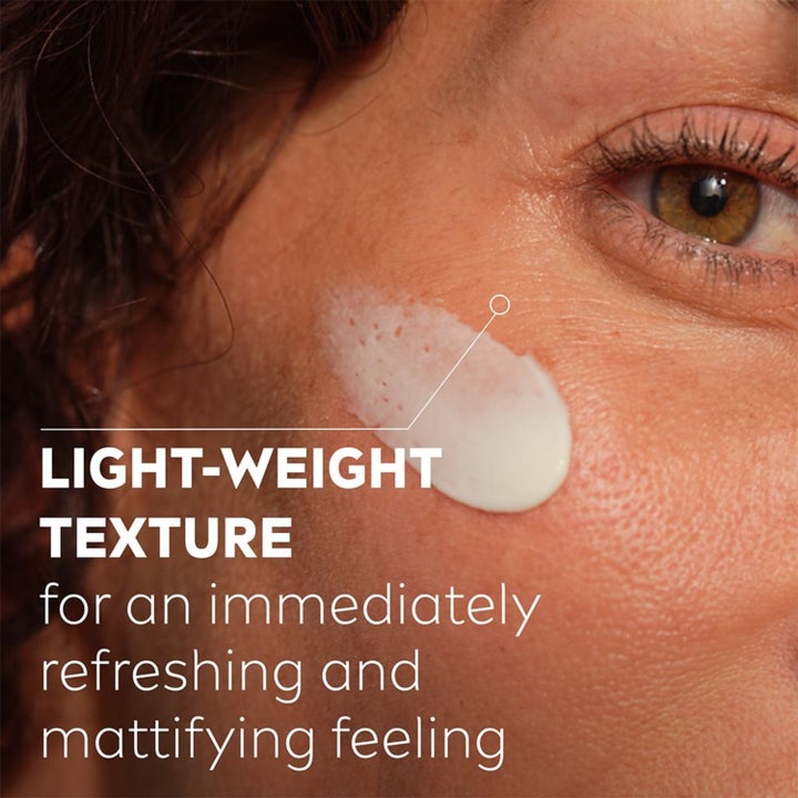 NIVEA Q10 Power Pore Minimising Day Cream 50 ml i åpen krukke som viser kremens lette tekstur.