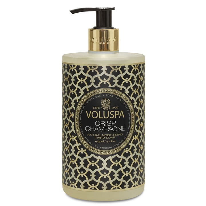 Voluspa Crisp Champagne 450ml fuktighetsgivende håndsåpe i dekorativ flaske med gullmønster og sort pumpe