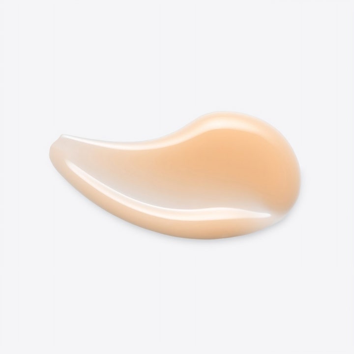 Origins GinZing Into the Glow Brightening Serum 30 ml glødgivende ansiktsserum med en myk ferskenfarget og glatt tekstur