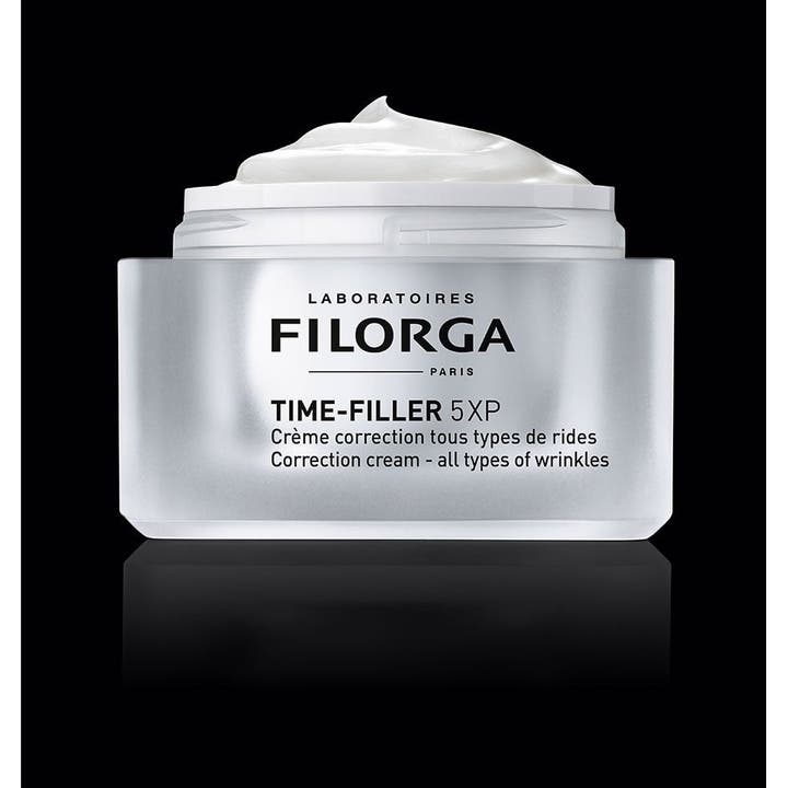 Filorga Time-Filler 5XP Cream 50 ml rynkekrem i sølvfarget krukke med synlig hvit og kremet tekstur