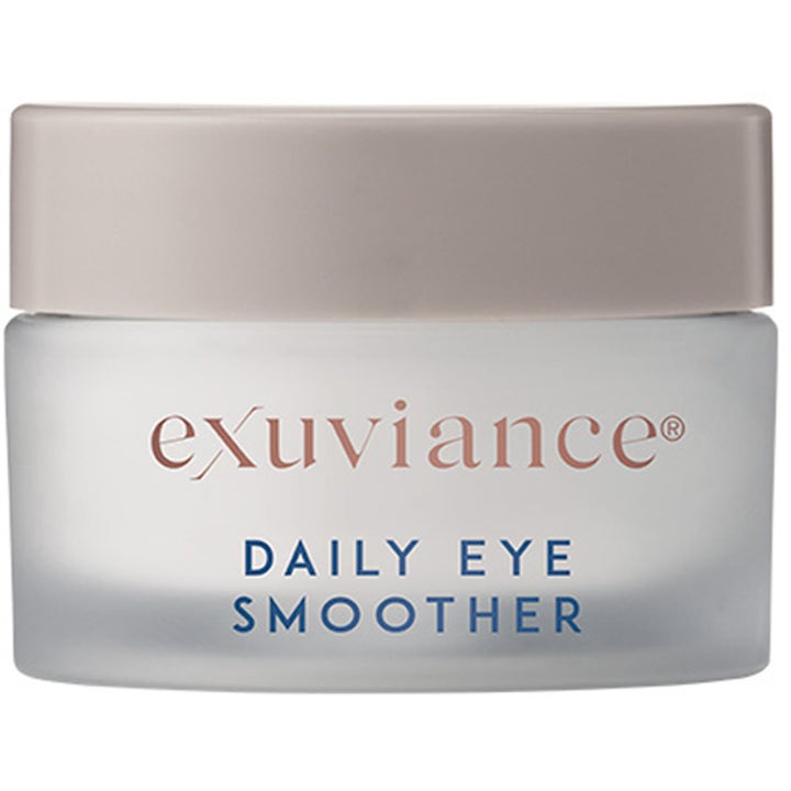 Exuviance Daily Eye Smoother 15 ml utglattende øyekrem i frostet glasskrukke med beige lokk som pleier huden.