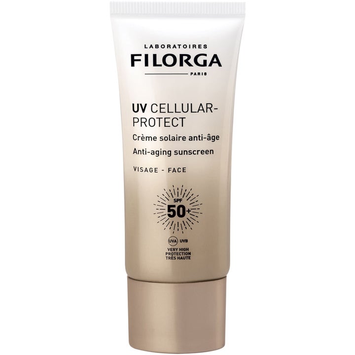 Filorga UV Cellular-Protect SPF 50+ anti-age solkrem som gir høy beskyttelse i en beige og hvit tube.