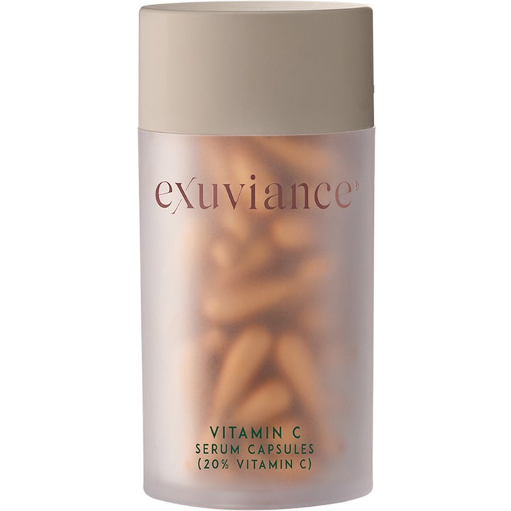 Exuviance Vitamin C Serum Capsules 60 stk glødgivende serum med gullfargede kapsler i frostet beholder med beige lokk
