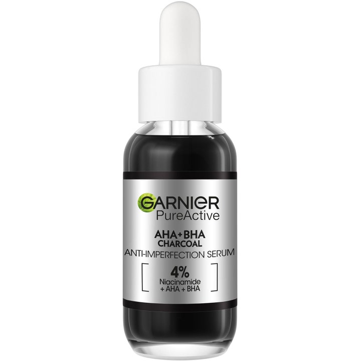 Garnier PureActive AHA+BHA Charcoal Serum mot urenheter i glassflaske med hvit pipette og kullsvart innhold