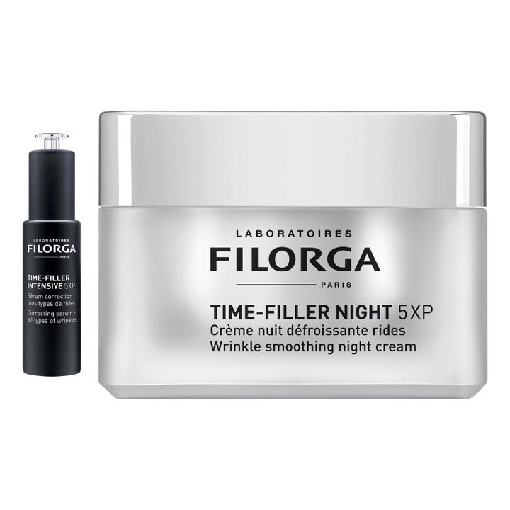 Filorga Time-Filler Night og Intensive mot rynker i sølvfarget krukke og frostet serumflaske med åpen pipette.