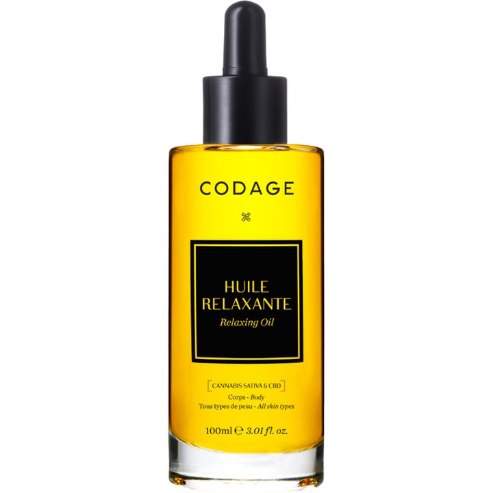 Codage Huile Relaxante 100 ml beroligende kroppsolje med CBD i en klar glassflaske med svart pipettekork og gyllen olje.
