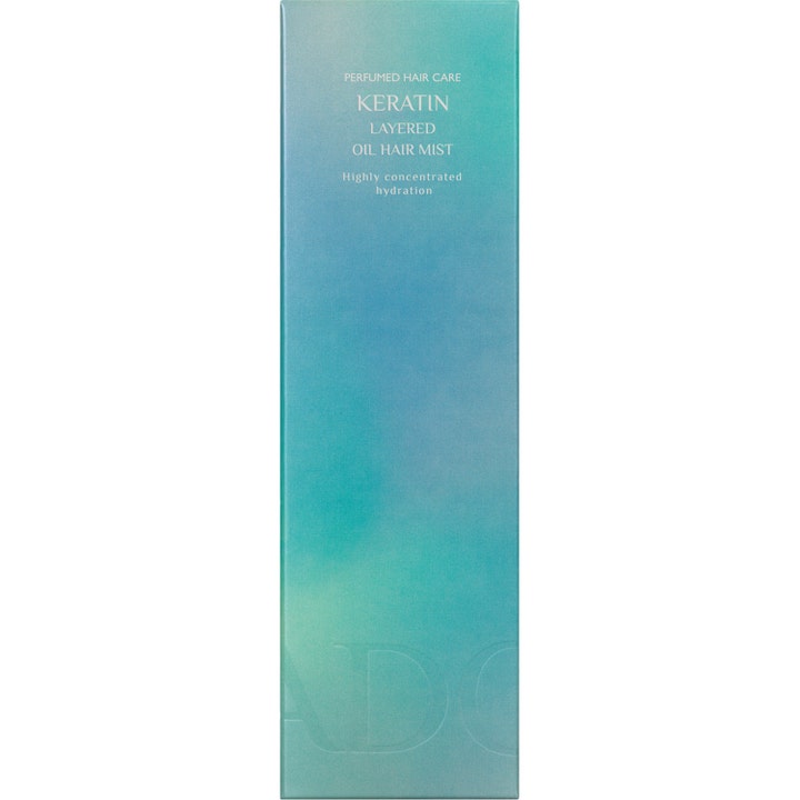 La'dor Keratin Layered Mist 130 ml fuktighetsgivende hårmist i en eske med blågrønn gradient for pleie