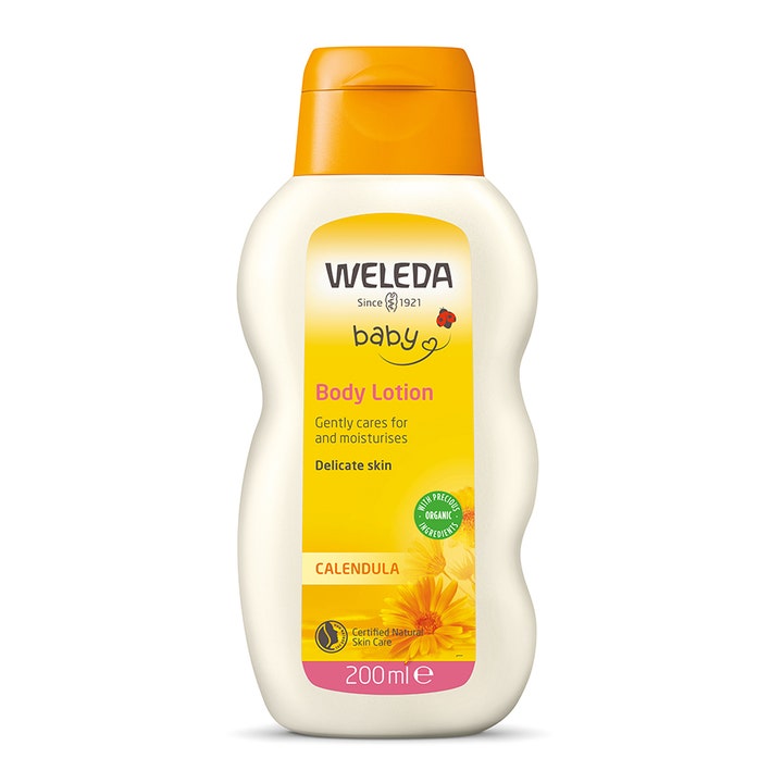 Weleda Baby Calendula Body Lotion 200 ml fuktighetsgivende barnelotion i hvit flaske med oransje kork og ringblomster