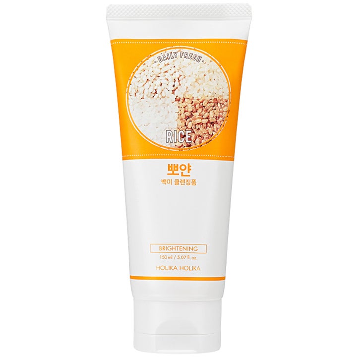 Holika Holika Daily Fresh Rice 150 ml brightening ansiktsrens på hvit tube med bilde av riskorn og oransje detaljer.