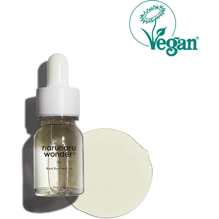 haruharu wonder Black Rice Facial Oil 10 ml vegansk ansiktsolje i glassflaske med pipette og lysegul tekstur