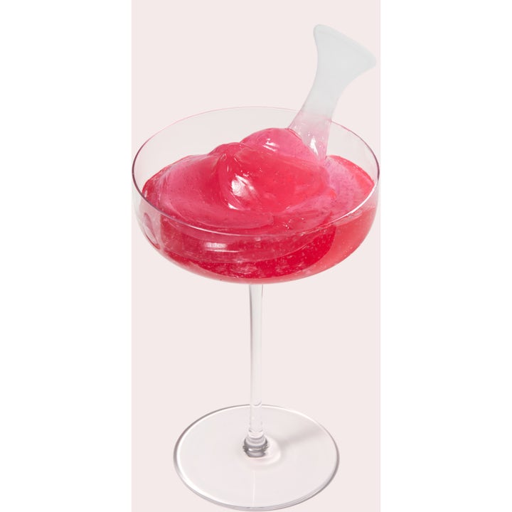 Medicube Collagen Jelly Cream 110 ml fuktighetskrem med rosa geltekstur og applikator i et glass