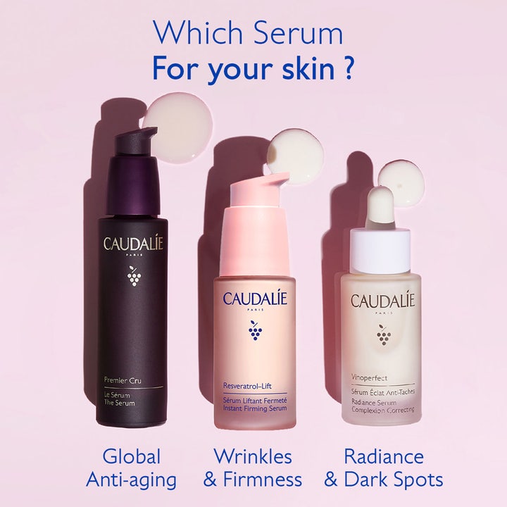 Caudalie Resveratrol-Lift 30 ml oppstrammende serum i rosa pumpeflaske mot rynker vist med andre serum.